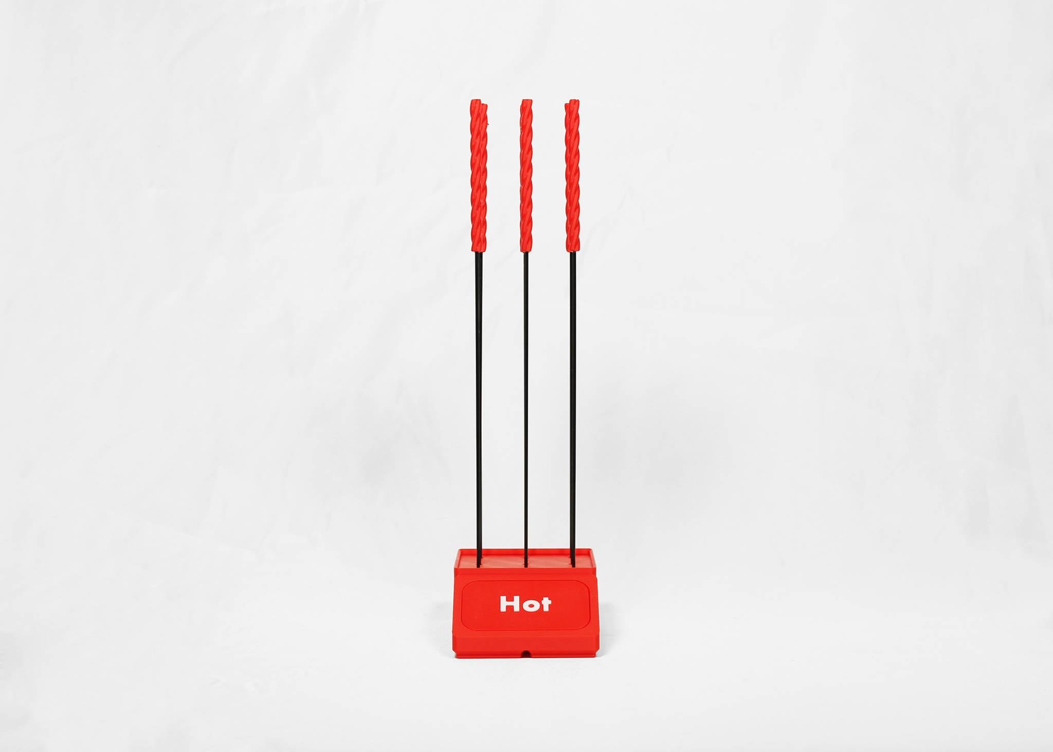 Three vertical black rods topped with red handles and a red base labeled 'Hot' in white text, set against a plain white background.
